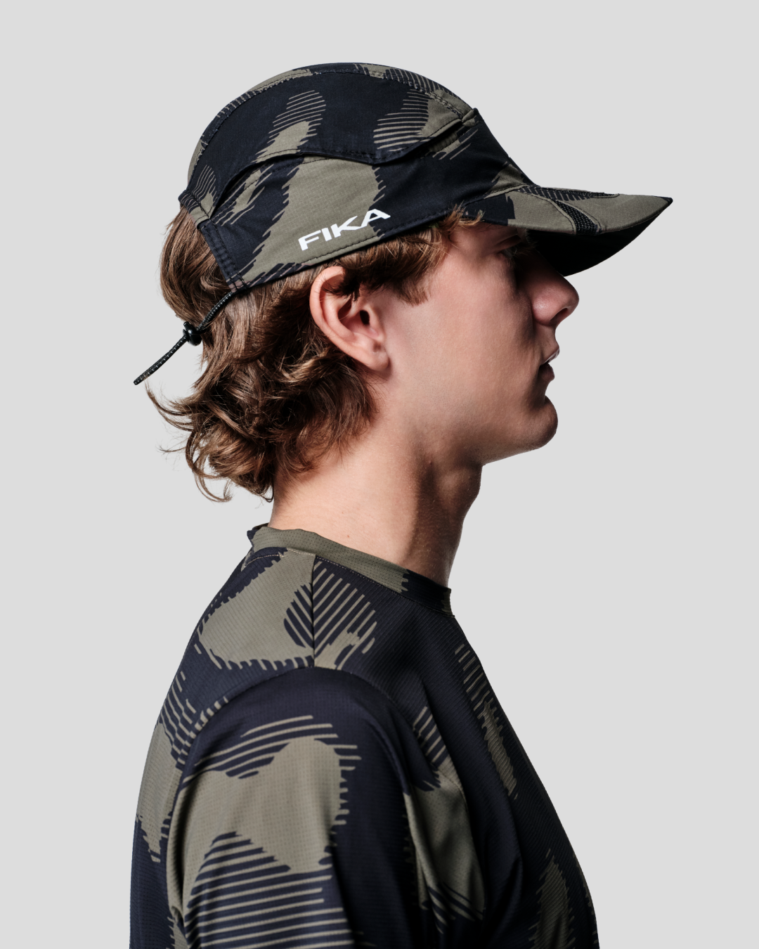 SLIPSTREAM™ TRAINING CAP MIDNIGHT MOSS